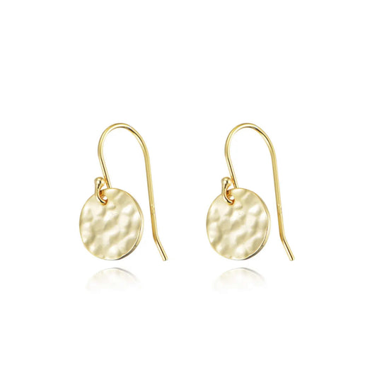 Gold earrings with round hammered design on a white background