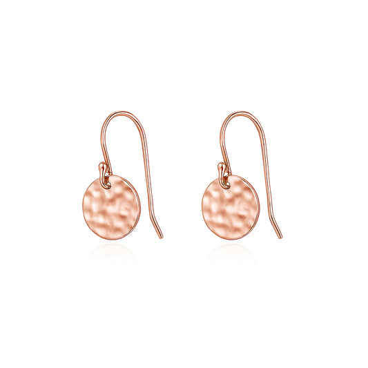 Rose gold earrings on a white background