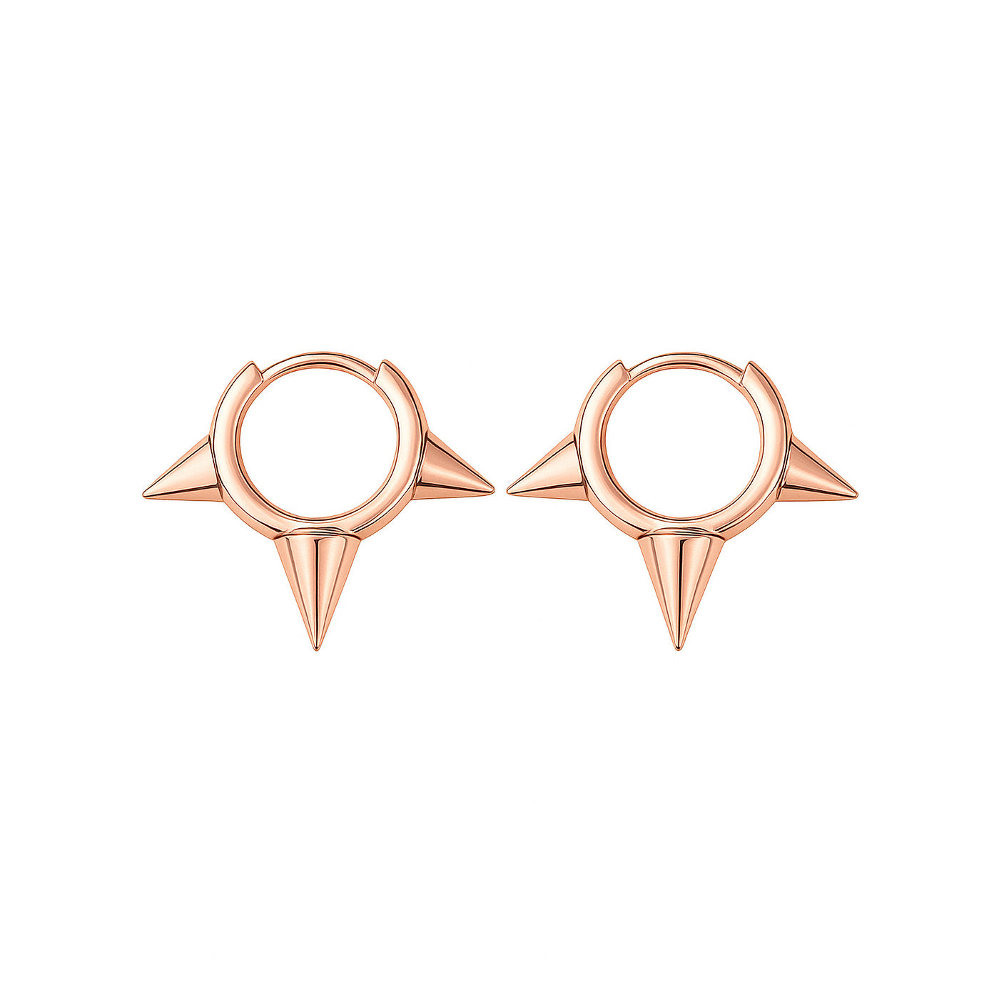 Rose gold hoop earrings with spike designs on a white background — jewellery detail
