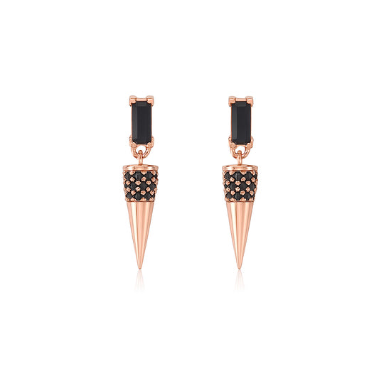 Rose gold spike earrings with black gemstones on a white background