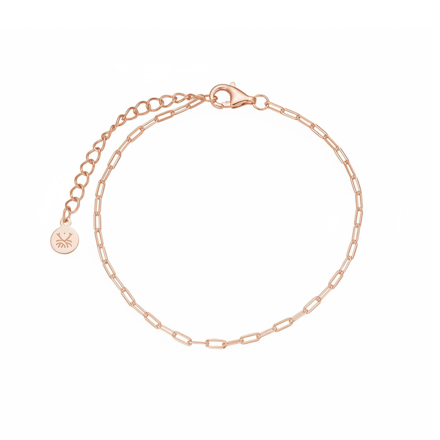 Rose gold simple paperclip chain bracelet on a white background — jewellery detail
