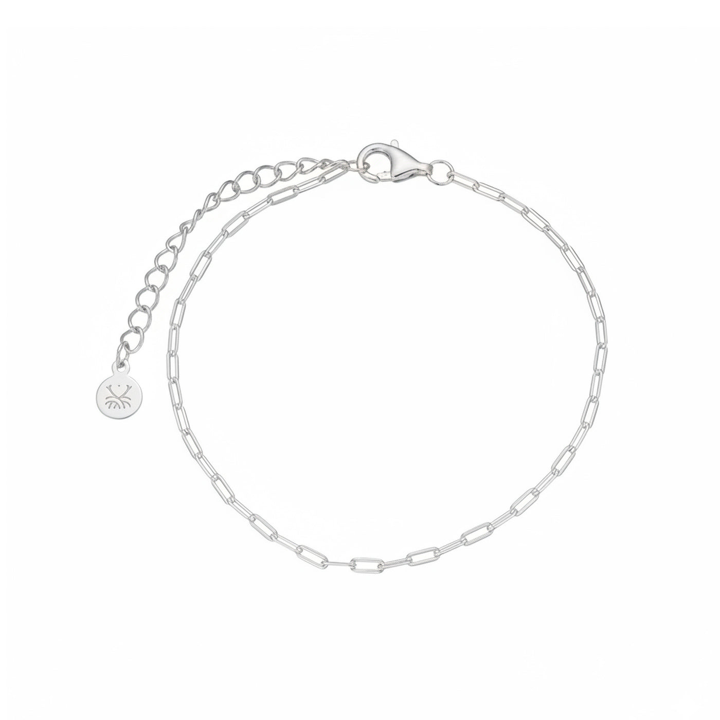 Silver simple paperclip chain bracelet on a white background — jewellery detail
